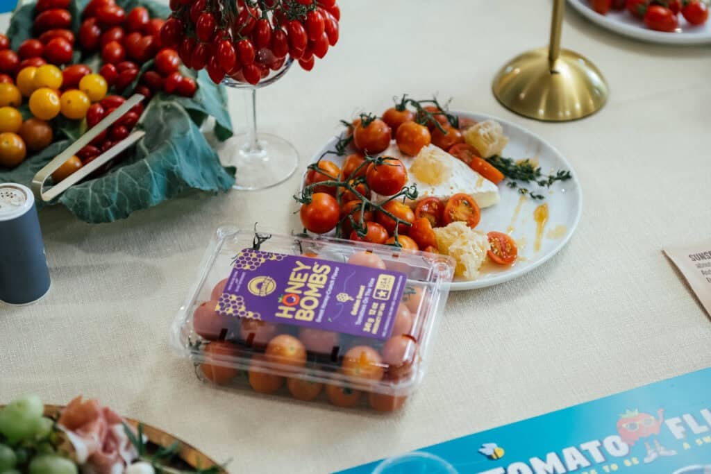 an image of tomatoes on a table with a beautiful tablescape